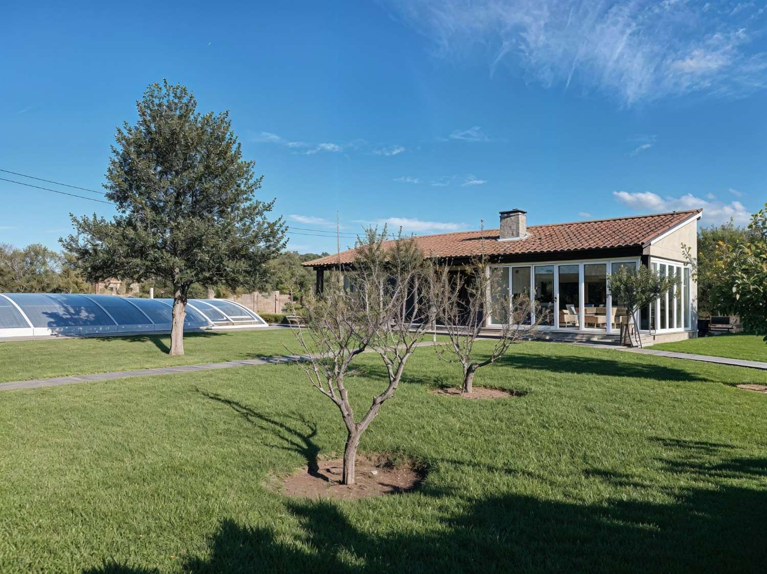 Villa with swimming pool, surrounded by gardens, fruit trees, for sale in Ribadumia...